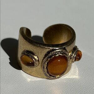 Elegant Nina Ricci Gold-Tone Ring with Cabochon Amber Color Accents